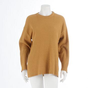 YVES SAINT LAURENT, a yellow mustard sweater, from the 1980s.