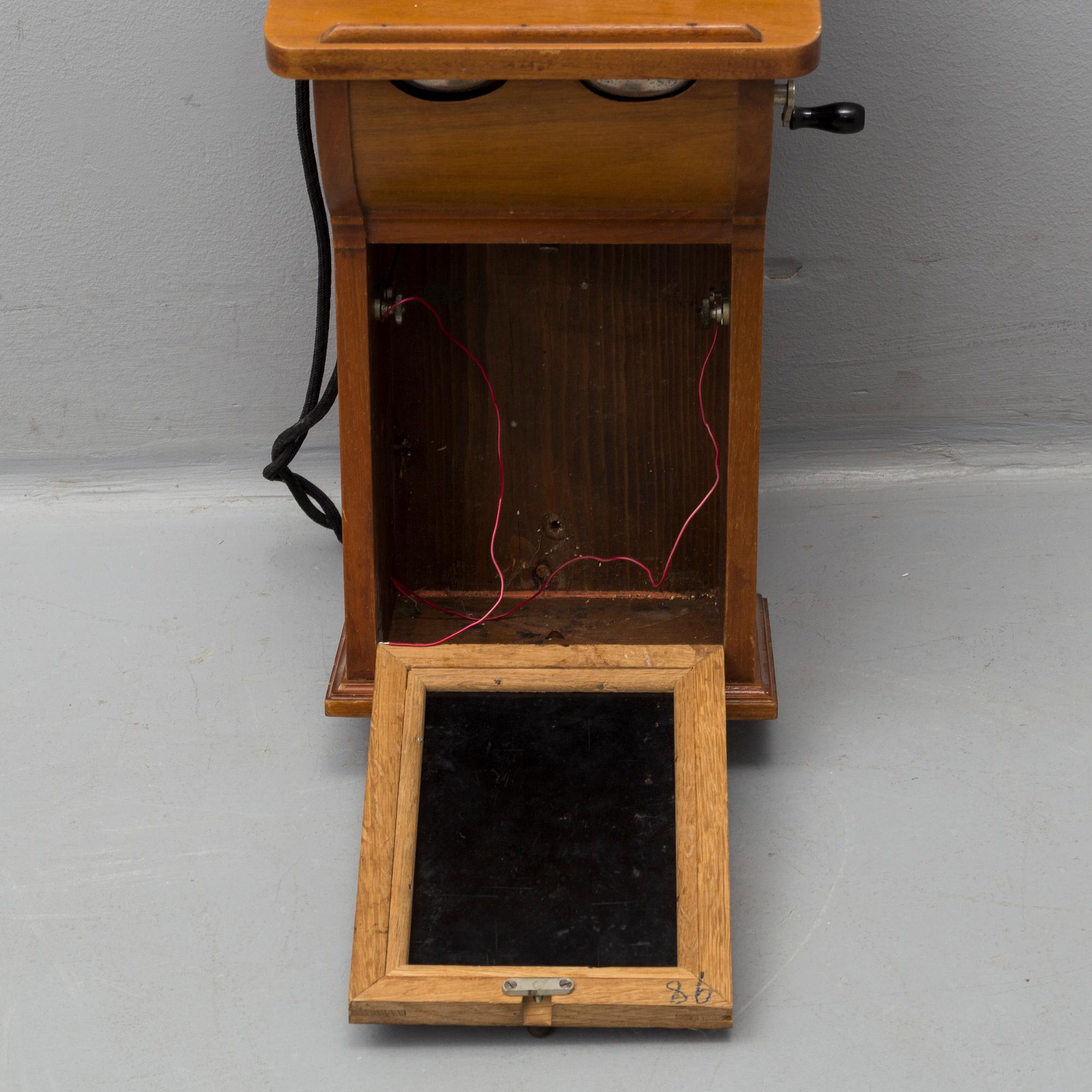 An early wall mounted telephone, L.M. Ericsson, Stockholm, early 20th century.
