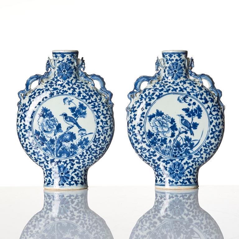 A pair of blue and white moon flasks, Qing dynasty, 19th century.