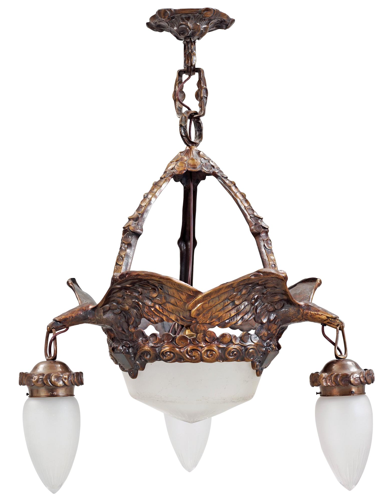 An Art Nouveau patinated brass chandelier, attributed to Alice Nordin, Böhlmarks, Stockholm 1910's-20's.