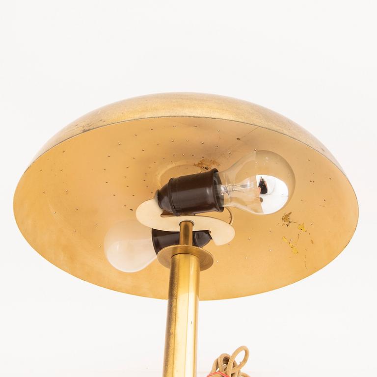 A brass table lamp possibly by Bertil Brisborg, from the mid 20th century.