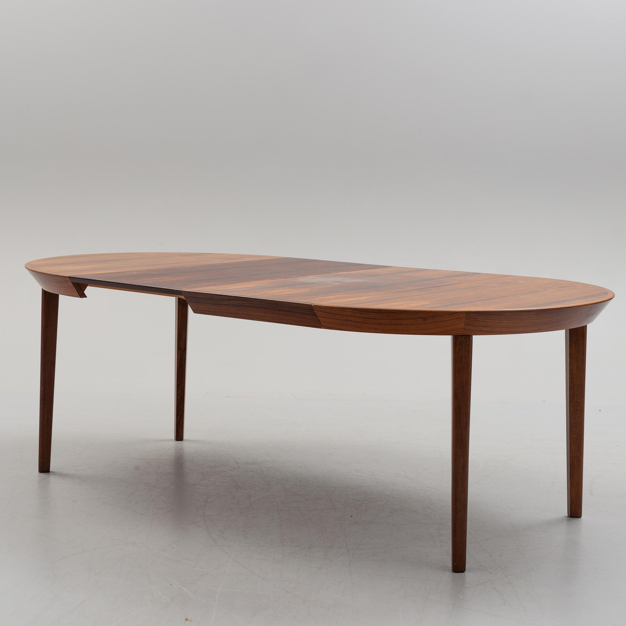 A 1950s/1960s rosewood veneer table.