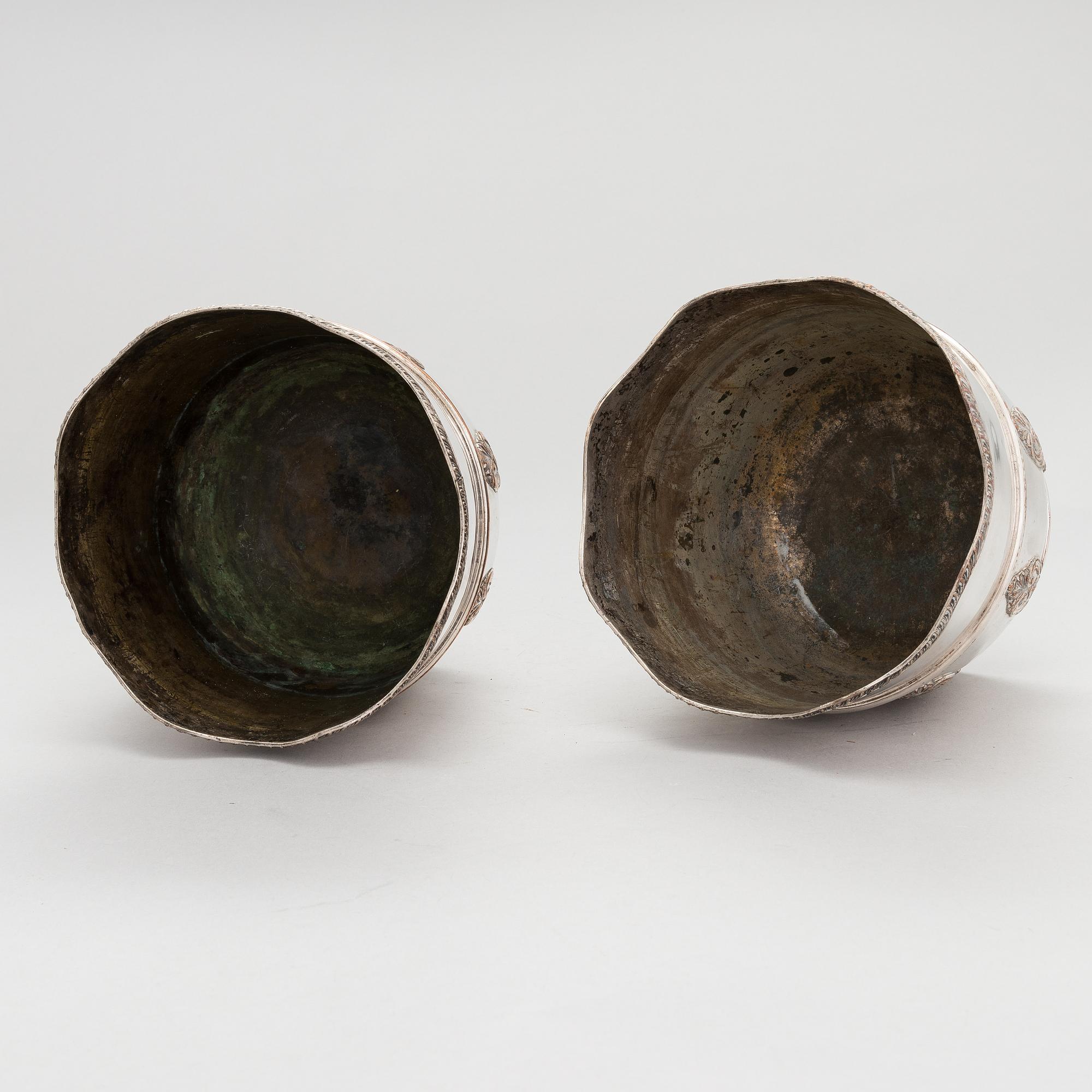A pair of 19th-century English champagne cooler buckets.