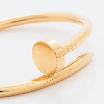 A Cartier "Juste en Clou" bracelet in 18K gold.