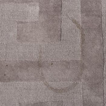A Layered "Wool Cubes" carpet, 390x620 cm.