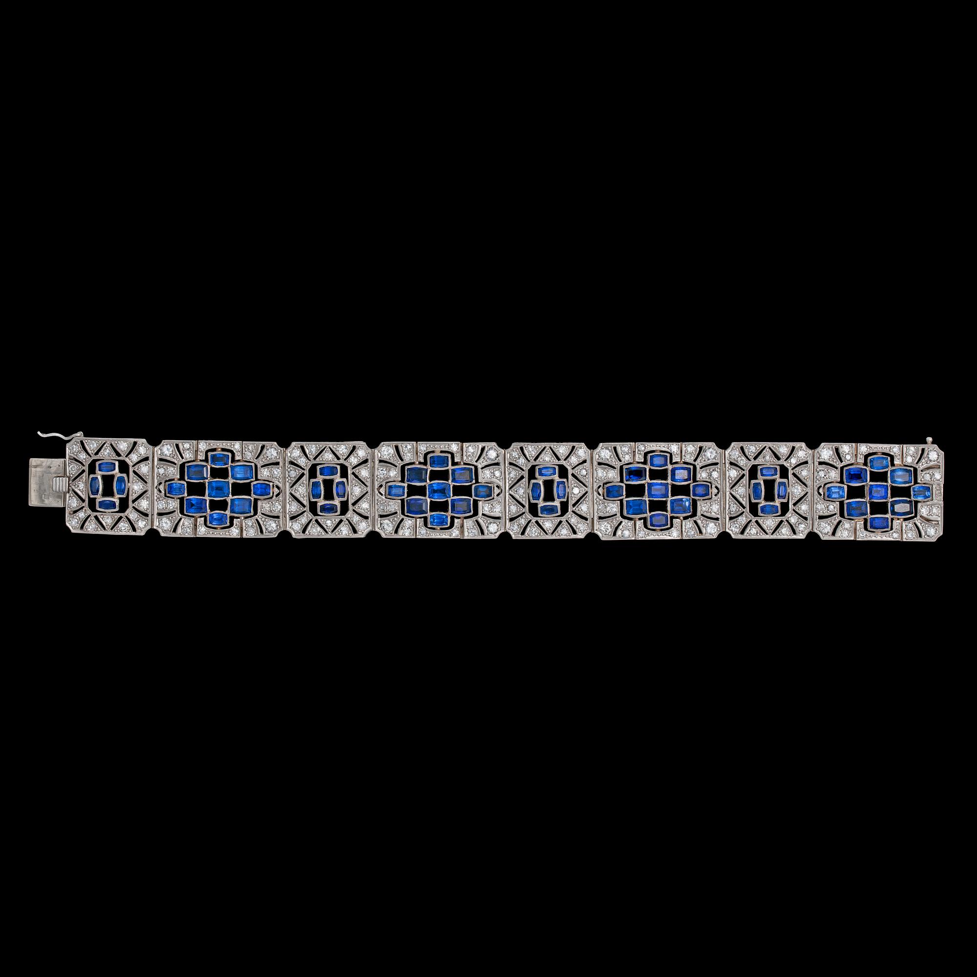 An Art Deco diamond and blue sapphire bracelet, tot. app 10 cts/ resp. 25 cts. 1930's.