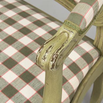 A pair of 20th century  Rococo style armchairs.