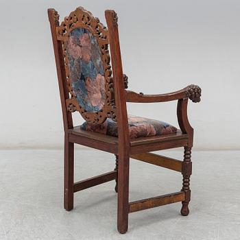 A Baroque style oak armchair, first half of the 20th Century.