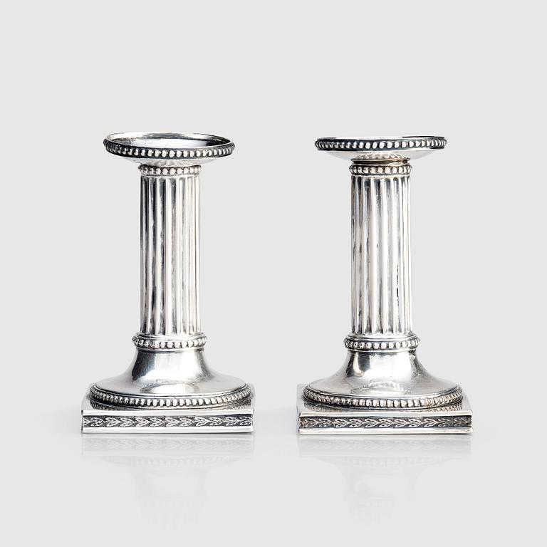 A Swedish pair of 18th century Gustavian silver candlesticks, marks of Johan Ekholm, Stockholm 1795.