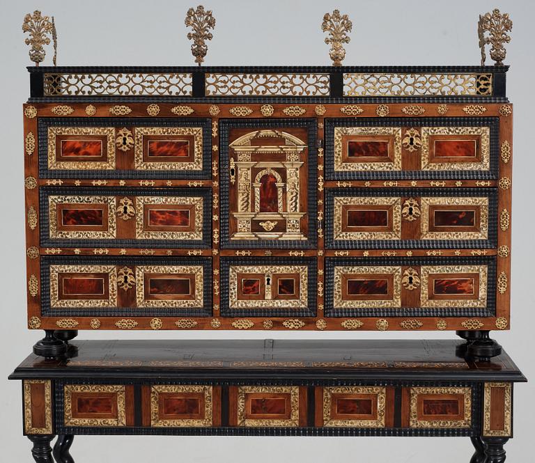 A Baroque 17/18th century cabinet, on later stand.