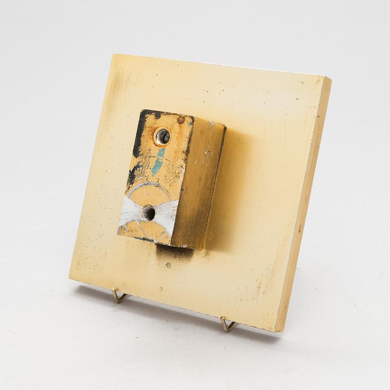 Omega, A door handle from latter half of the 20th century.