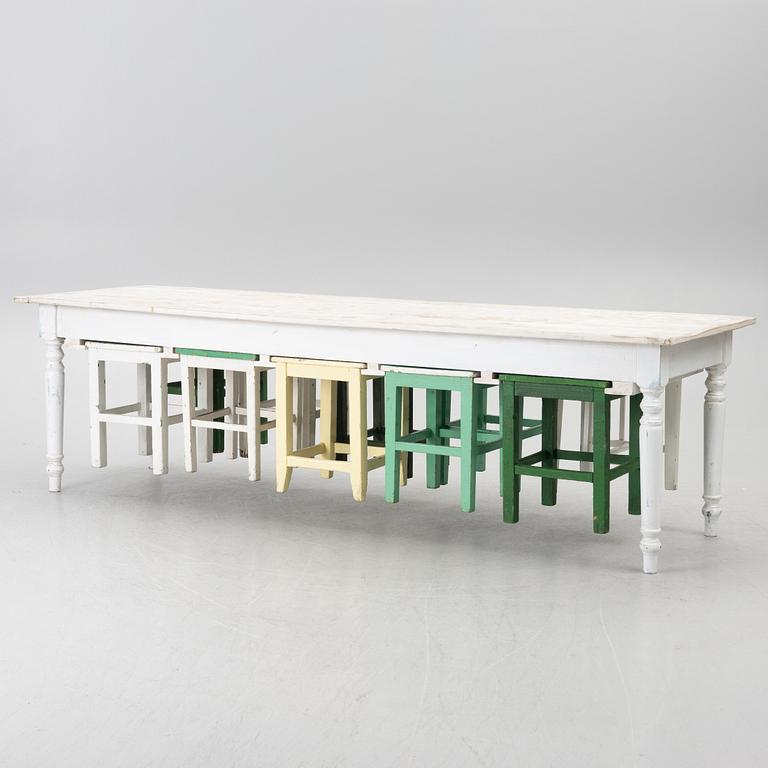 A table with stools, 20th/21st century.