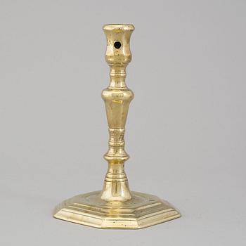 An 18th century bronze candlestick.