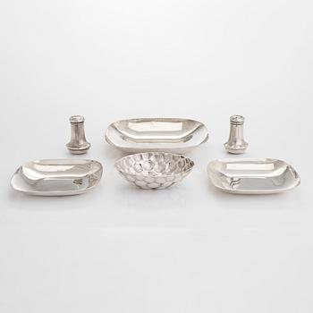 Tiffany & Co MAKERS, a four piece set of sterling silver bowls, salt and pepper shakers by other maker.