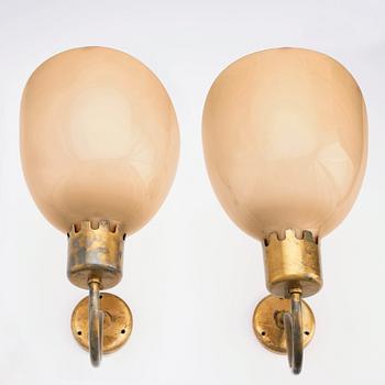 Harald Notini, a pair of large wall sconces, model '8566/A', Arvid Böhlmarks Lampfabrik, Sweden, 1940s.