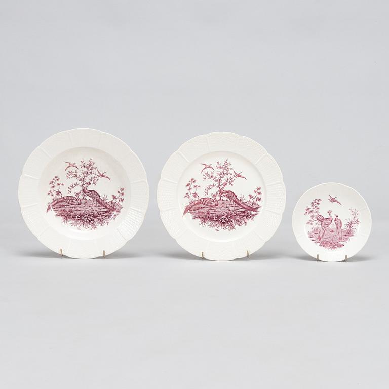 A 53-piece set of Wedgwood 'Liverpool birds' rimmed plates, early 20th century.