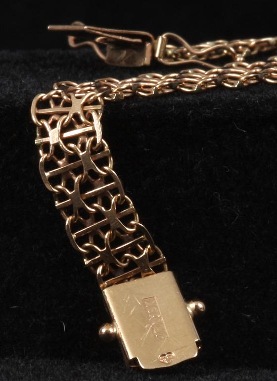 ARMLÄNKAR, 2 st 18k guld. 9 resp 17g.