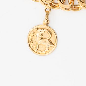 Bracelet, 18K gold, with charms including zodiac signs.