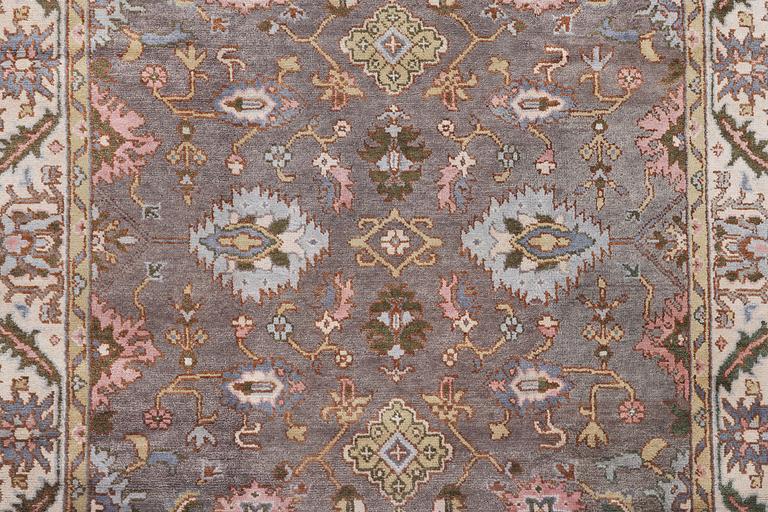 An oriental carpet of Safavid design, c. 310 x 250 cm.