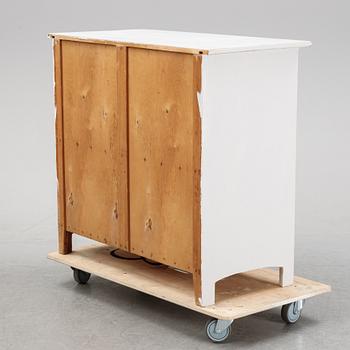 A conrtemporary painted cupboard.