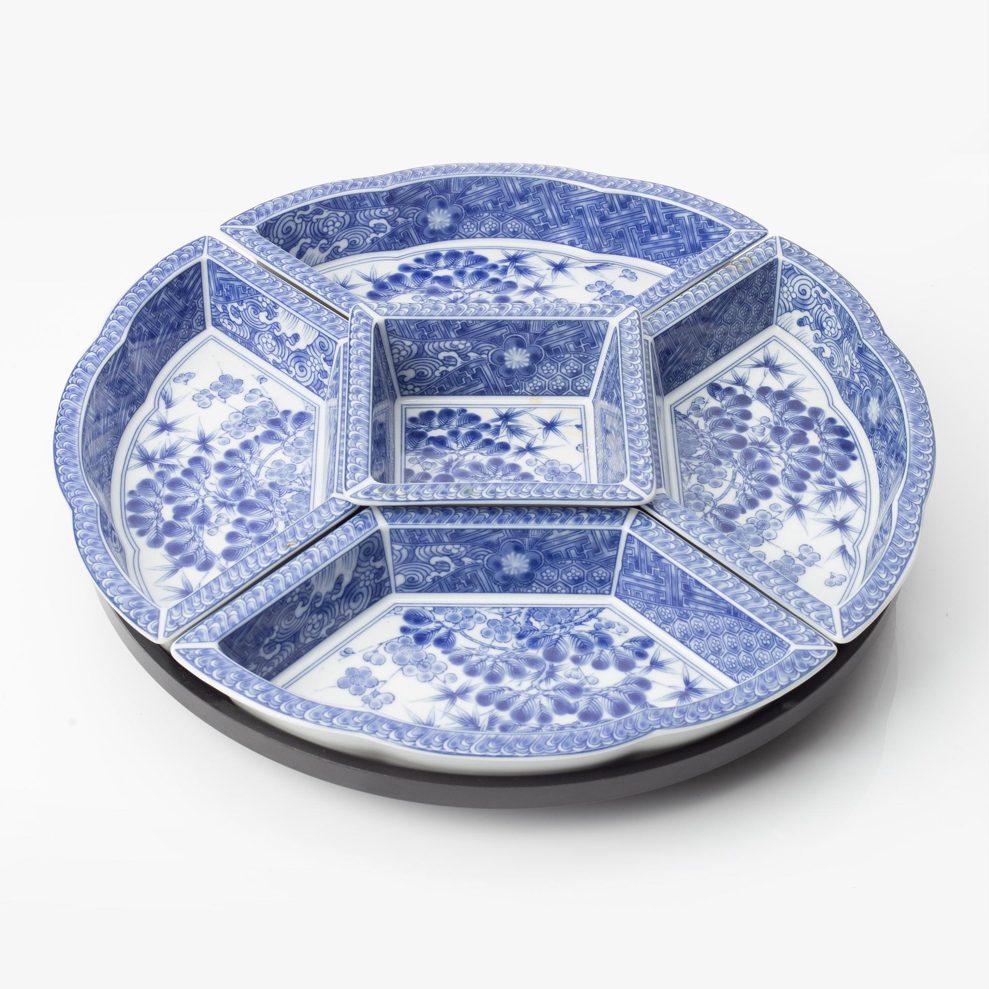 A Japanese blue and white six piece cabaret on a 'lazy Susy', secon half of the 20th century.