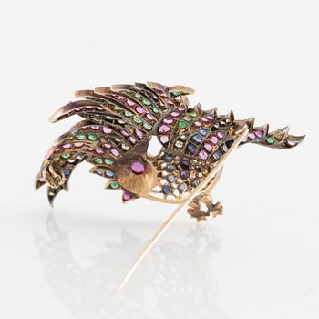 Brosch i form av fågel 14K guld med rubiner, diamanter, safirer och smaragder.