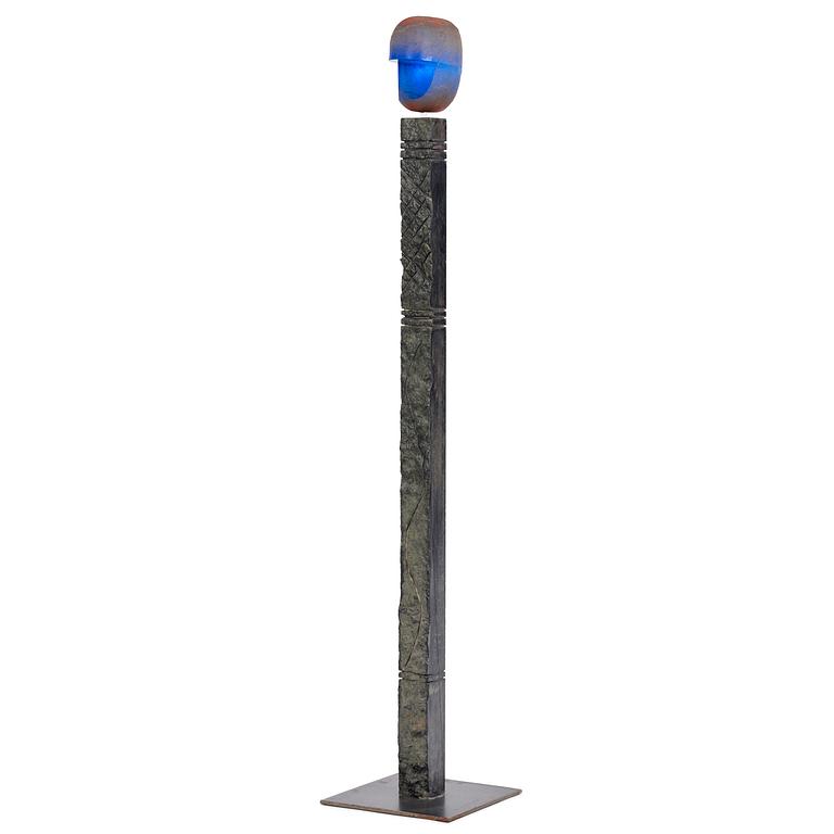 Bertil Vallien, a unique sand-cast glass sculpture of a head, on a high pedestal of polished limestone, Kosta Boda.