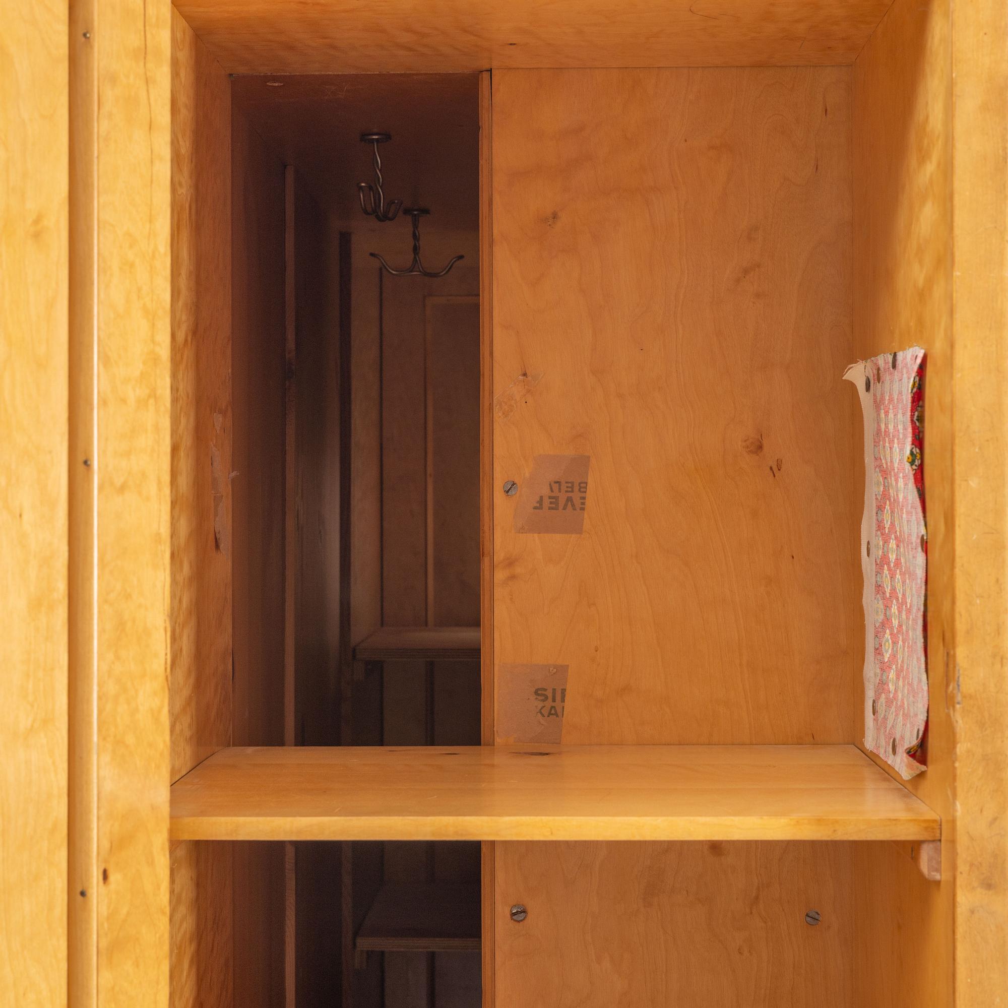 A birch veneered book case/wardrobe, 1930's/40's.