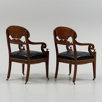 A pair of early 19th century mahogany  Empire armchairs, presumably from the Baltic countries.