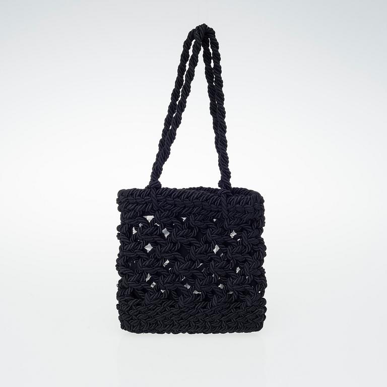 A POLLINI HANDBAG.