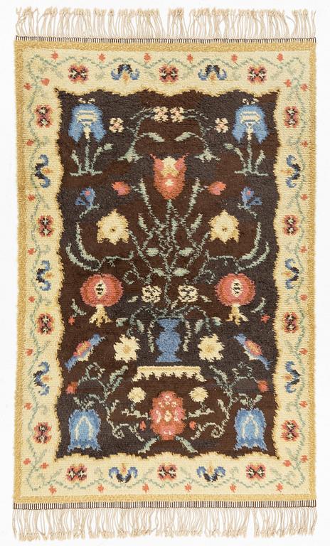 A rug, c. 235 x 155 cm.