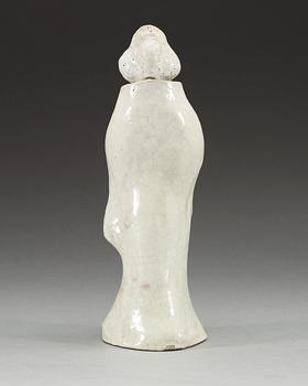 A white ge-glazed figure of a lady with flowers, presumably Japanese.