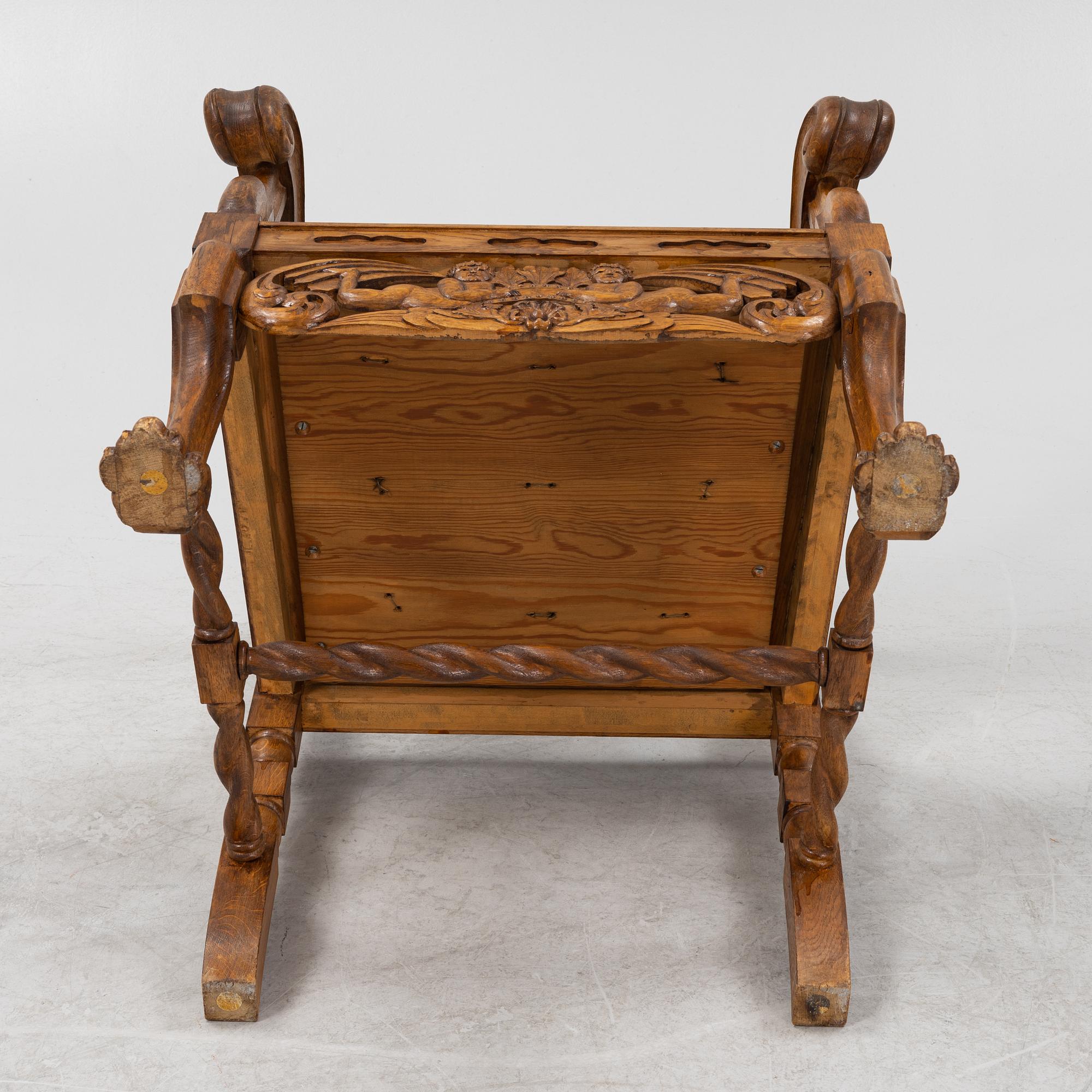 A pair of Baroque style armchairs, circa 1900.