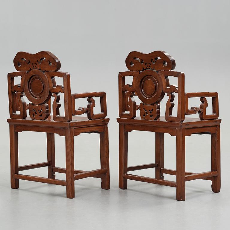 A pair of hardwood armchairs, Qing dynasty (1644-1912).