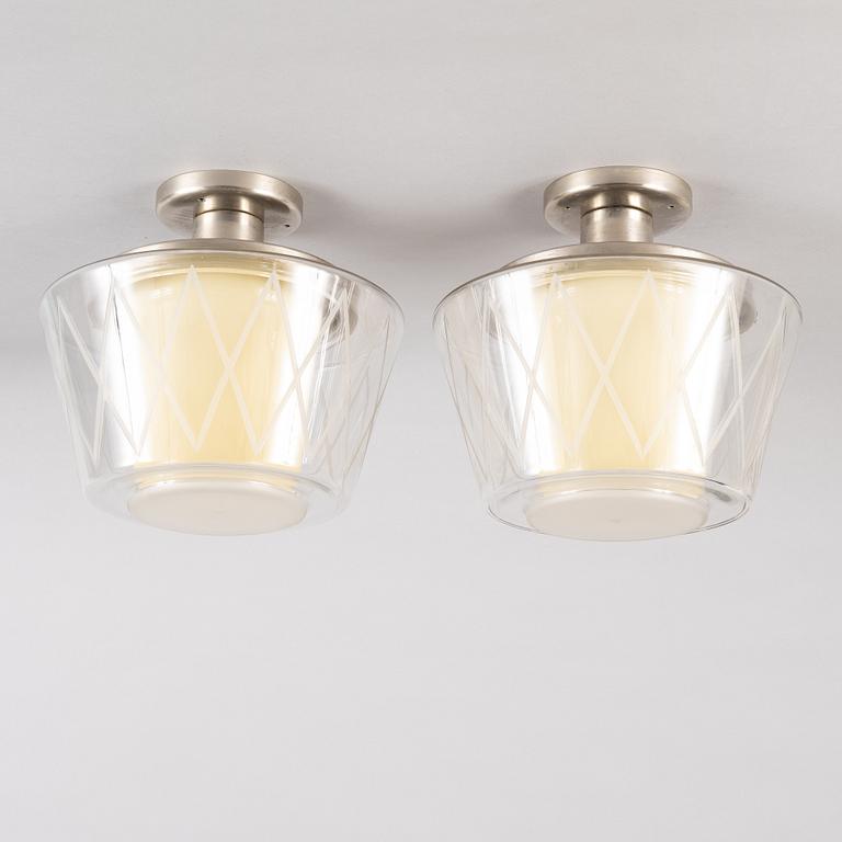 Harald Notini, a pair of ceiling lamps, model "11197", Arvid Böhlmarks 1940s-50s.