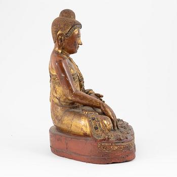 A seated wood Buddha, Thailand, 20th century.