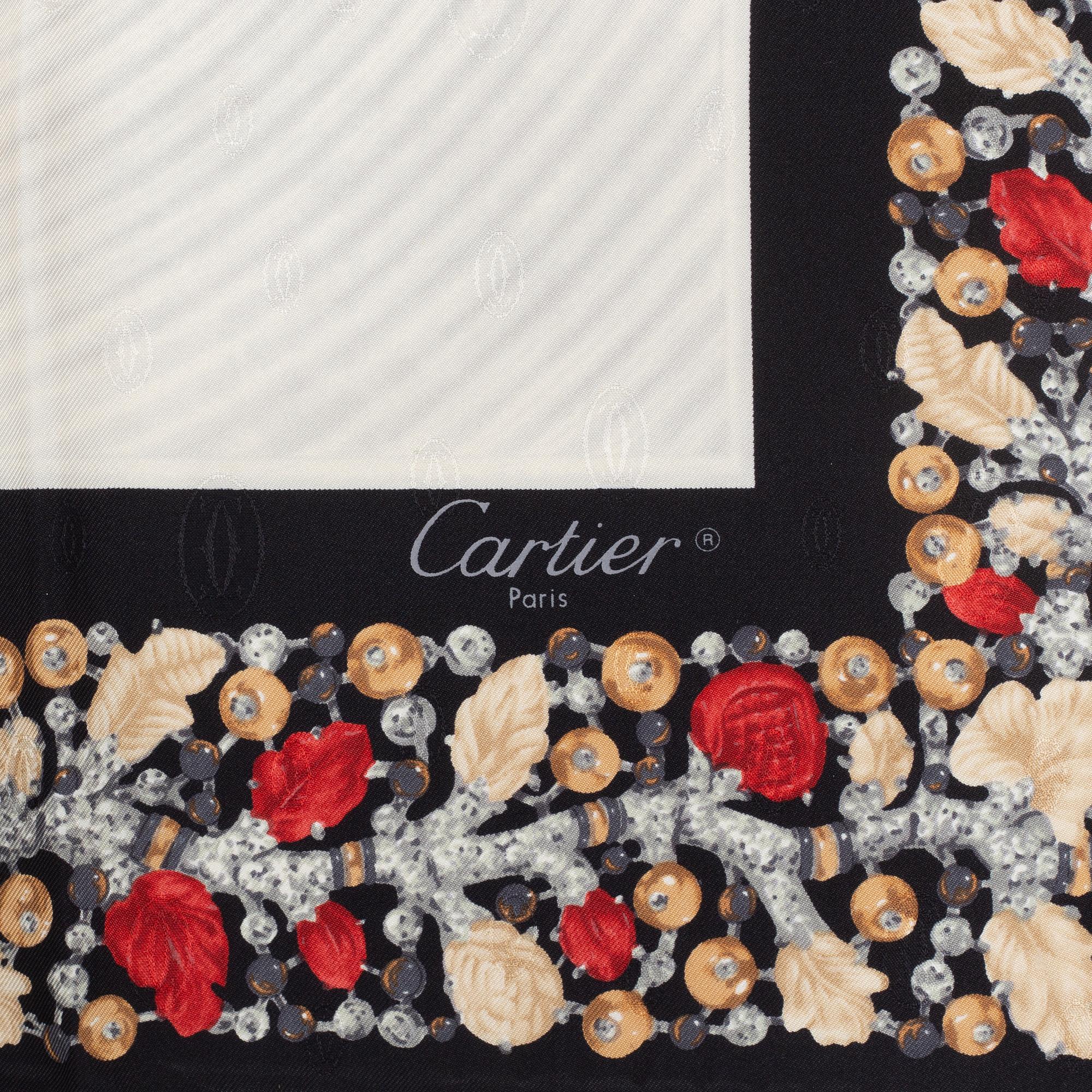 Cartier, a jacquard silk scarf.