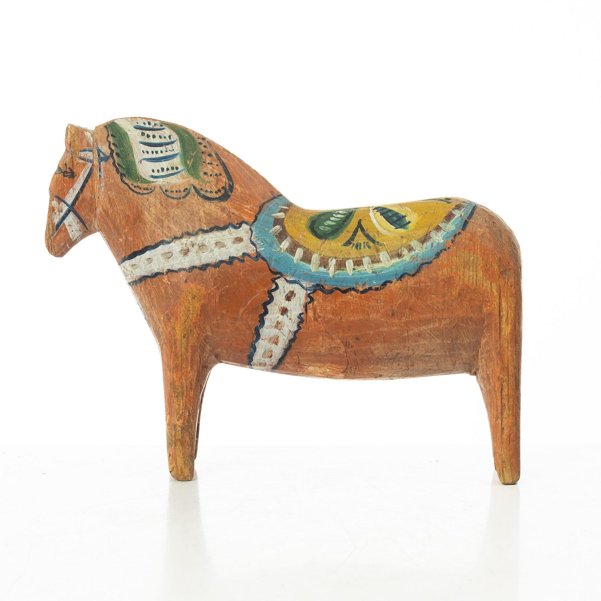 Dala horse. Folk art. First half of the 20th century.