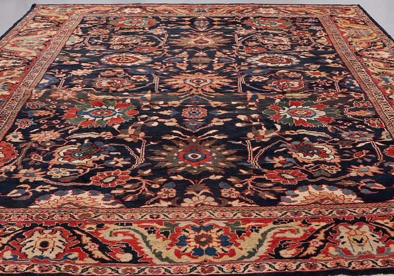 A CARPET, an antique Ziegler Mahal, ca 417,5 x 326 cm (as well as one end with 2 cm flat weave).