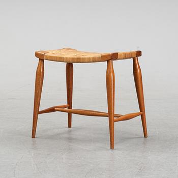 A model '967' mahogany and rattan stool by Josef Frank for Firma Svenskt Tenn.