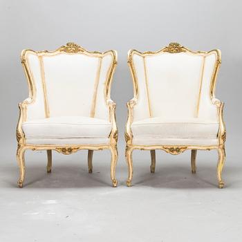 A pair of louis quinze style bergerer armchairs, first part of the 20th century.