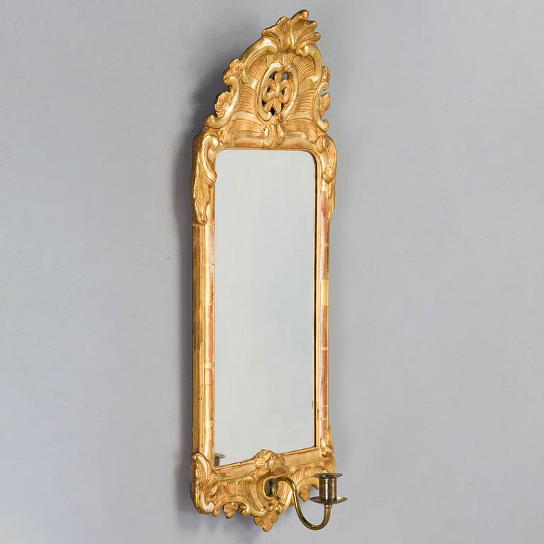 A Rococo mirror sconce, 18th Century.