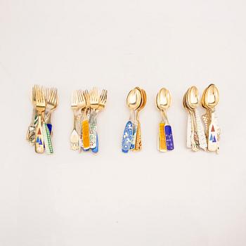 A Danish 20th century set of 44 pcs of sterling adn enamel cutlery mark of A Michelsen Denmark weight 1927 grams.