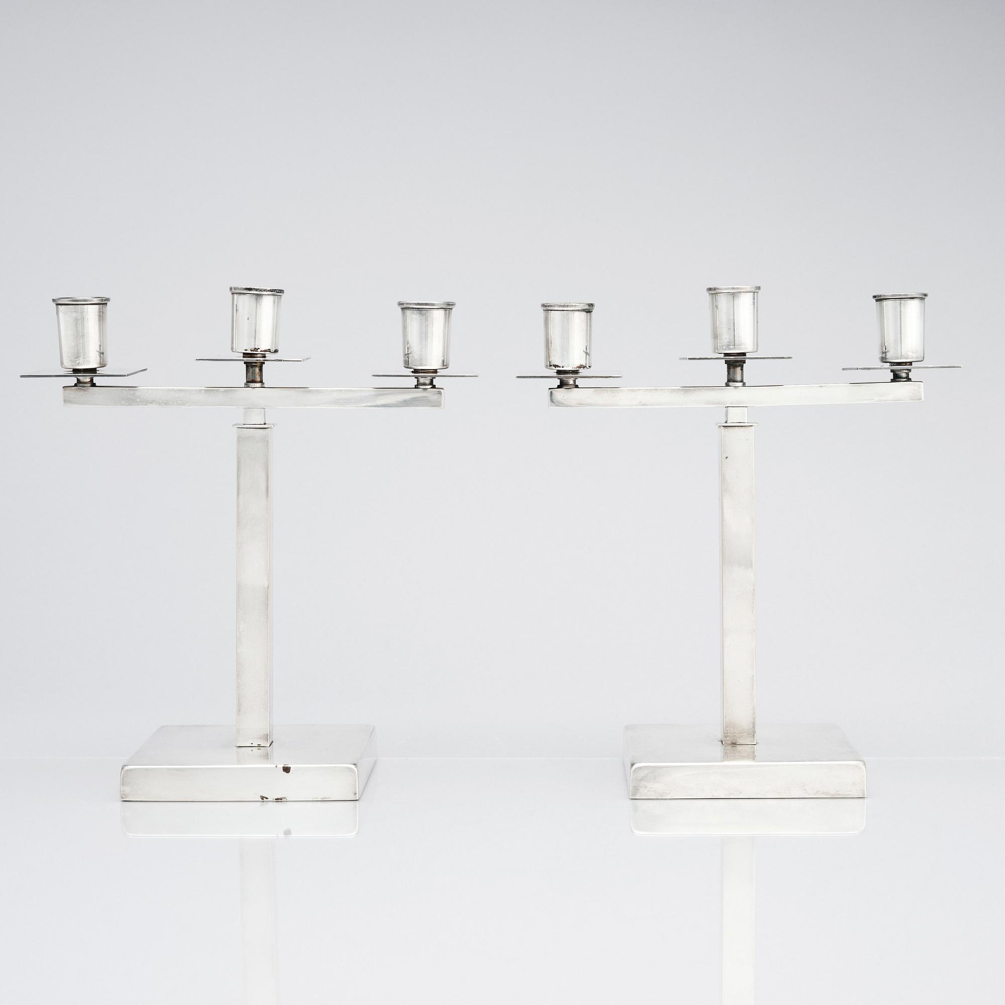 Rolf Engströmer, attributed to, a pair of silver plated candelabra, Fabriksaktiebolaget Kronsilver, Sweden 1930s.