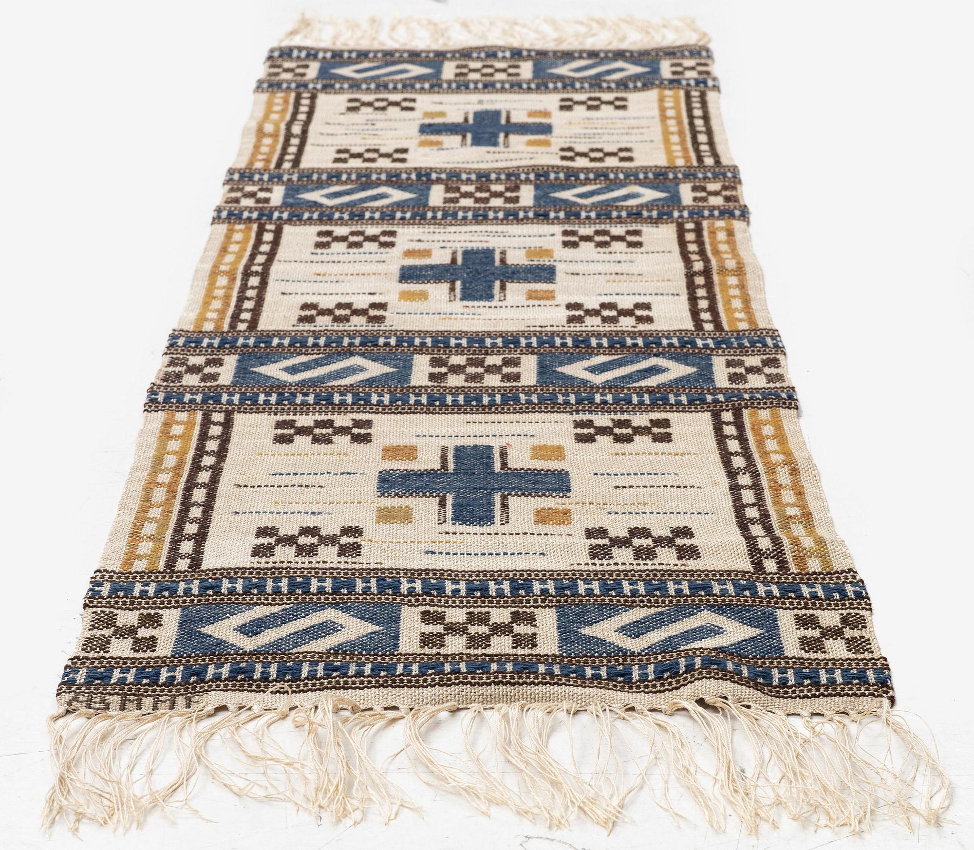 Märta Måås-Fjetterström, a 'Blå essbård' (also  S-bård), flat weave c. 142 x 42 cm, signed AB MMF.