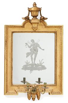 1003. A Gustavian two-light girandole mirror.