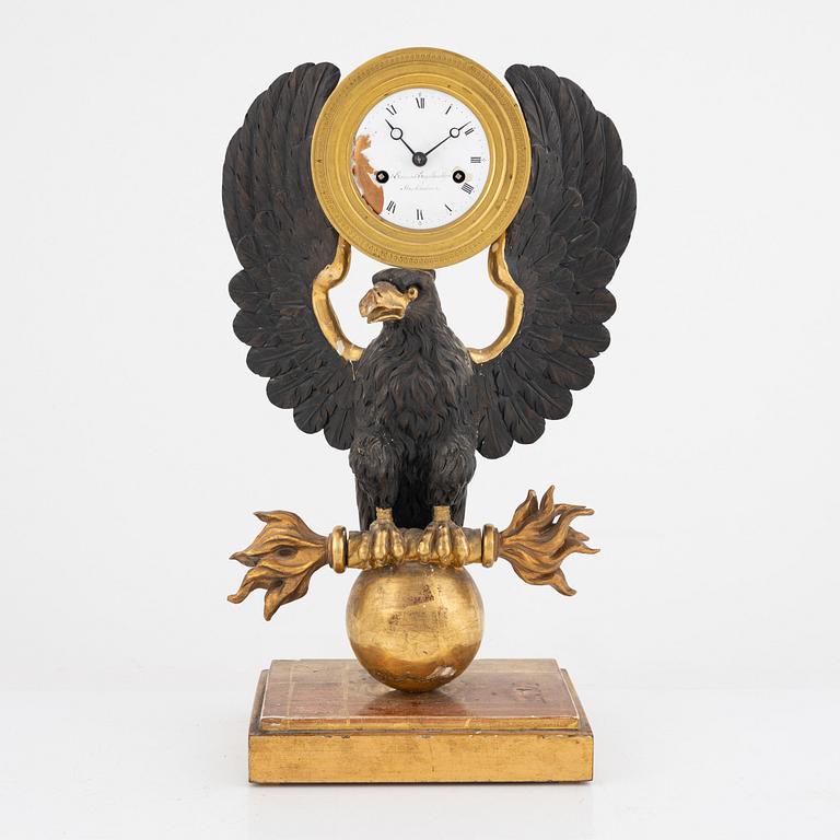 A Swedish Empire giltwood mantel clock by E. Engelbrechten (watchmaker active in Stockholm 1815-45).