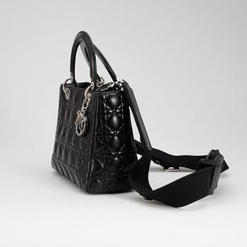 CHRISTIAN DIOR, a black leather "Lady Dior" bag.