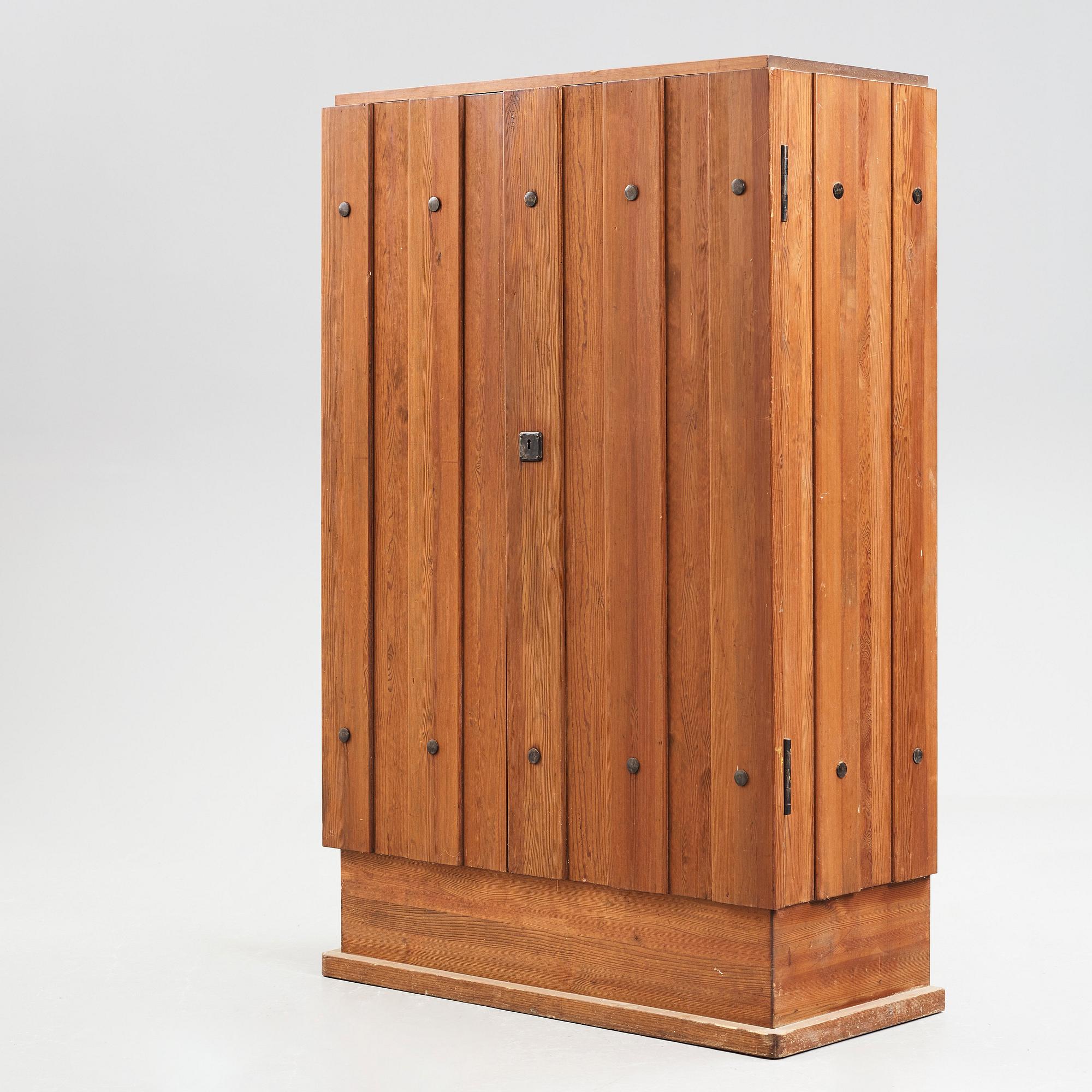 Axel Einar Hjorth, a "Lovö" stained pine cabinet, Nordiska Kompaniet, Sweden, 1930's.