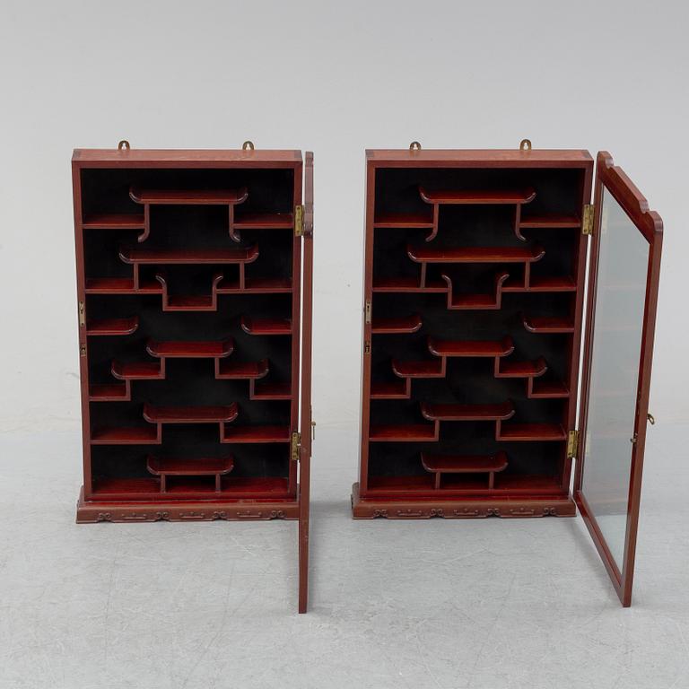 A pair of chinese wall cabinets, 20th century.